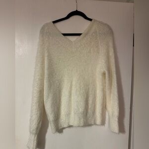 Loose fuzzy V-neck sweater
